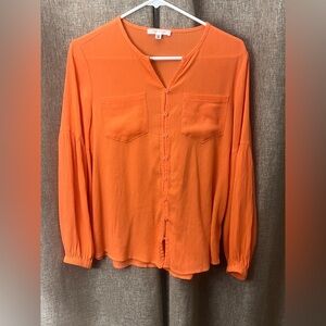 Vibrant Orange V-Neck Blouse from Daily Threads